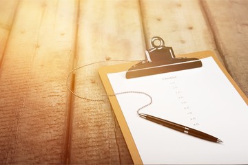 Fototapeta premium File Folder with pen and paper on background