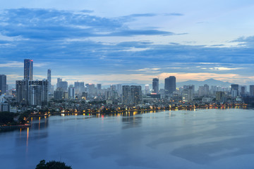 Fototapeta na wymiar Aerial view of Hanoi skyline at West Lake or Ho Tay. Hanoi cityscape at twilight