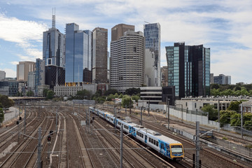 Fototapeta na wymiar Melbourne Skyline and Train Tracks
