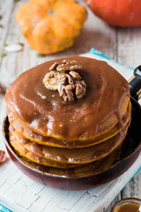 Spicy pumpkin pancakes with salted caramel topping