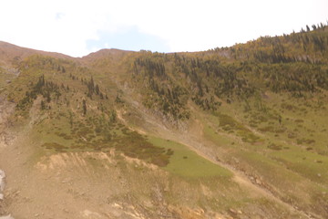Fototapeta premium View of big mountains under cloudy sky