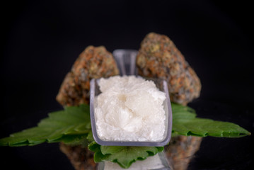 Cannabidiol crystal aka CBD, medical marijuana background