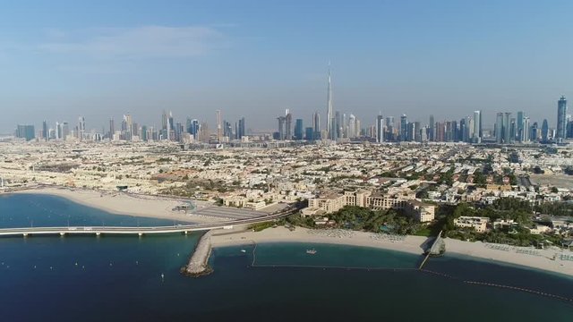 Aerial view Dubai city with road going towards the island Daria, U.A.E.