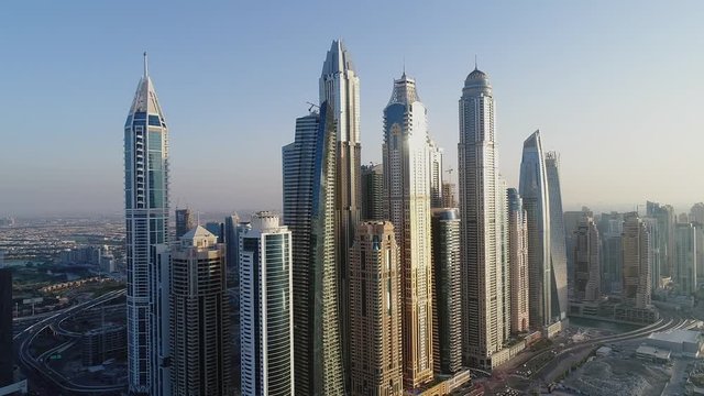 Aerial view Dubai city with busy road and skyscrapers, U.A.E.