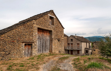 Fototapeta na wymiar Village with stone houses in the Pyrenees mountains