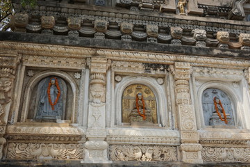 Fototapeta na wymiar Reliefs on the walls of the Mahabodhe temple, Bodhgaya, Bihar, India