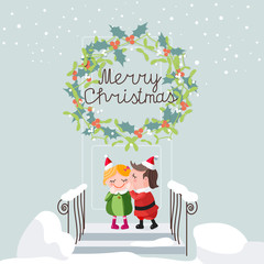 Christmas kiss of girl and boy. Christmas tradition