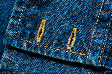 Textured blue denim texture stitched with a button-up texture