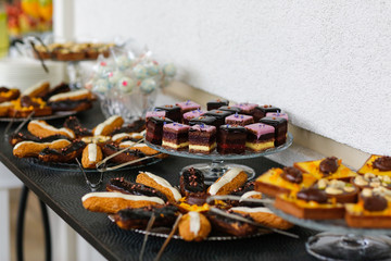 table with delicious cakes