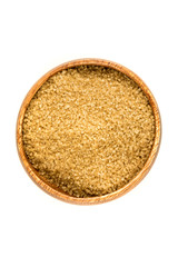 Scoop of raw cane sugar isolated over white