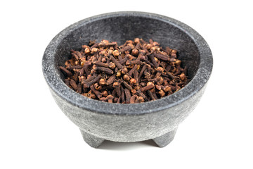 Whole clove heads and pieces isolated over white