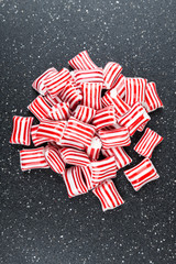 Red and white striped holiday candy isolated