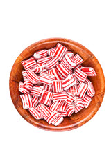 Red and white striped holiday candy isolated over white