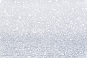 Shiny bokeh texture. Fresh snow sparkling on the sun