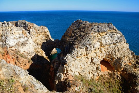 Elevated view of the cliffs with the ocean to the rear, Ponta da Piedade, Lagos, Portugal..