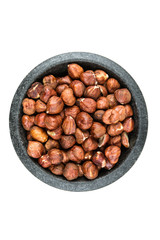 Pile of whole unshelled hazelnuts isolated