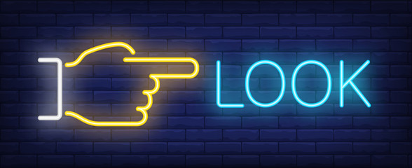 Look neon sign. Glowing inscription with fingers pointing straight in right direction on dark blue brick background. Can be used for night advertisement, pointers, outdoor billboards