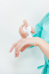 woman put cream on her hand