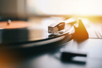 Turntable needle playing vinyl record