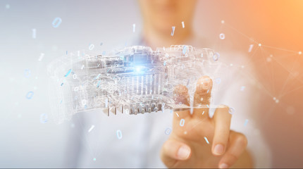 Businesswoman using wireframe holographic 3D digital projection of an engine