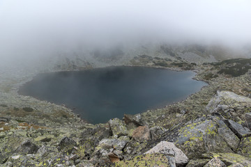 Amazing Landscape with fog over Musalenski lakes,  Rila mountain, Bulgaria