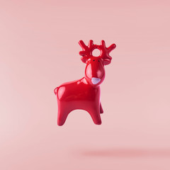Christmas concept.  Creative Christmas conception made by falling in air christmas wooden deer