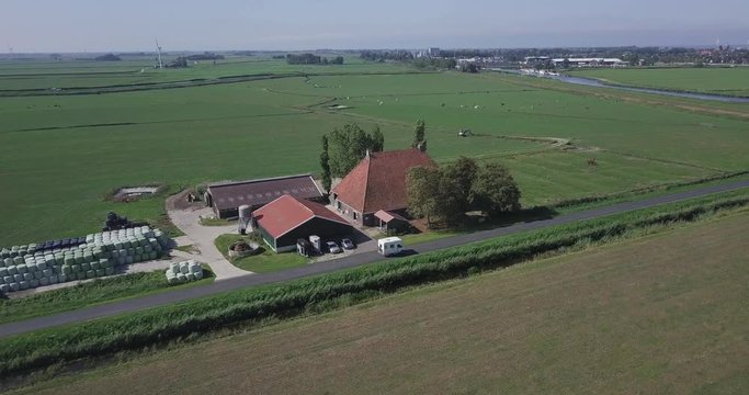 Aerial shot of a motorhome driving in a local road.