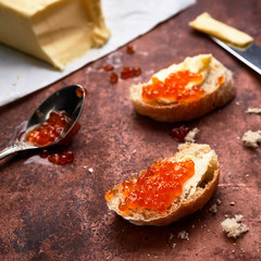 Salmon red caviar in tin and Sandwiches