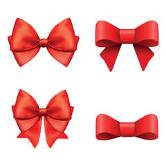 Set of red gift bows with ribbons.