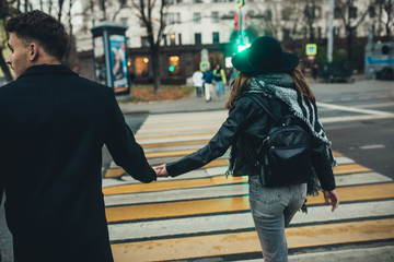 Fototapeta premium young couple walks on the city
