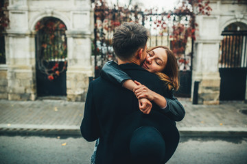 young couple walks on the city