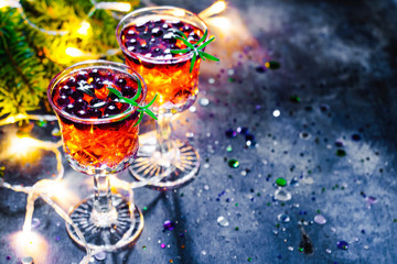 Fototapeta na wymiar Cranberry cocktail with rosemary