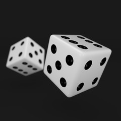 White dice with black dots showing different numbers and defocused cube in background isolated on black