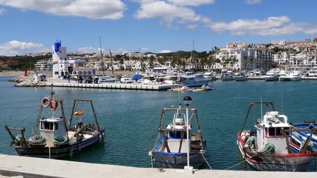 Static Close Shot - Traditional Spanish Fishing Boats at Puerto de La Duquesa in Spain