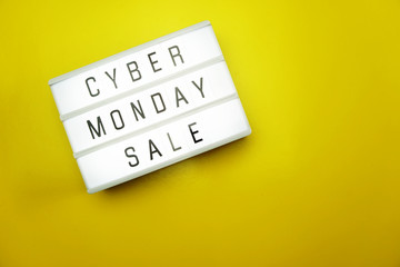 cyber monday sale flat lay top view on yellow background
