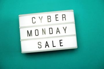 cyber monday sale flat lay top view on blue background