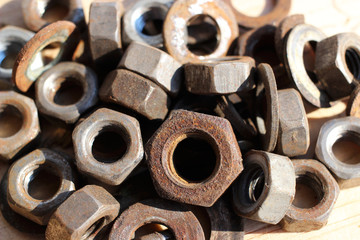 A heap of old rusty nuts.