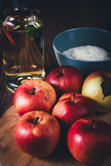 Red apples and oil and baking powder ingredients apple pie