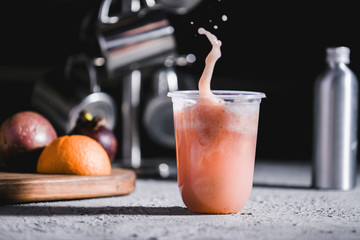 Fresh orange mangosteen fruit milkshake