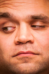 Looking right, pry man. Facial expression, emoji face, emotion close-up.