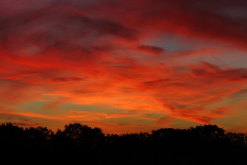 Fototapeta na wymiar Sonnenaufgang und Wolken
