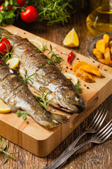 Grilled whole trout. Served with baked potatoes.