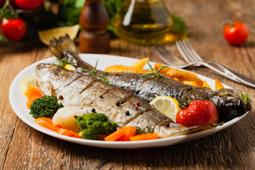 Grilled whole trout. Served with baked potatoes.