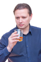 Fototapeta premium Man holding glass of whiskey or brandy alcohol drink