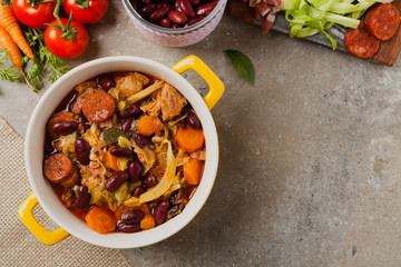 Traditional portuguese goulash with cabbage, beans and ribs.