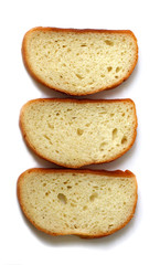Sliced white bread lying on white background