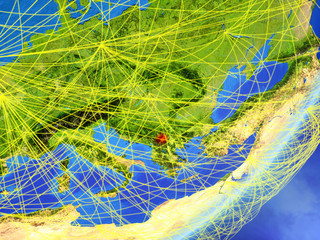 Kosovo on model of planet Earth with network at night. Concept of new technology, communication and travel.