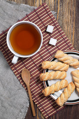 Shortbread cookies and tea on table