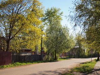 Spring street in a small Russian town. Russian spring nature. Russia, Ural, Perm Region