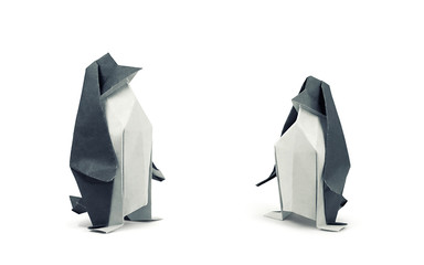 Two paper penguins isolated on white, clipping path included - obrazy, fototapety, plakaty